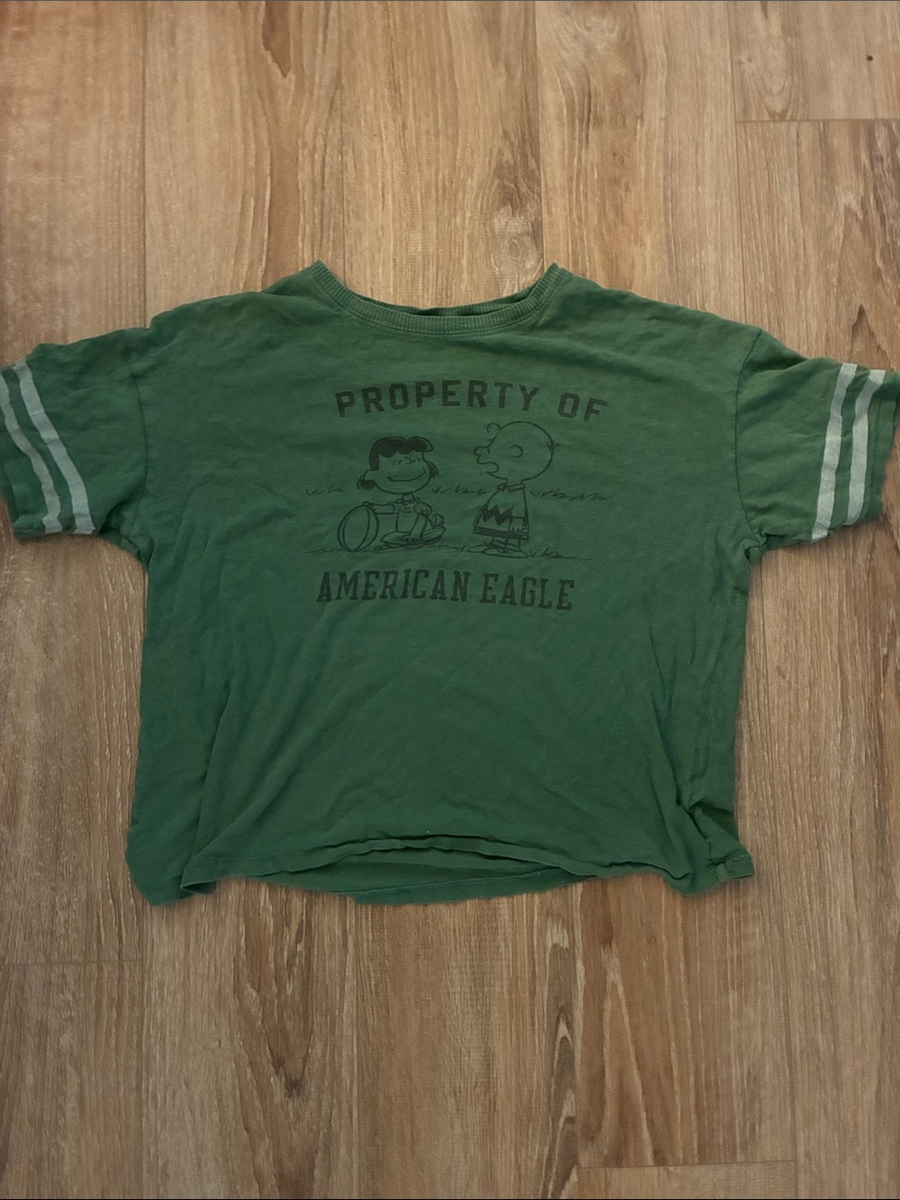 American Eagle Outfitters Green Short Sleeve 'Property of' Peanuts Graphic Tee